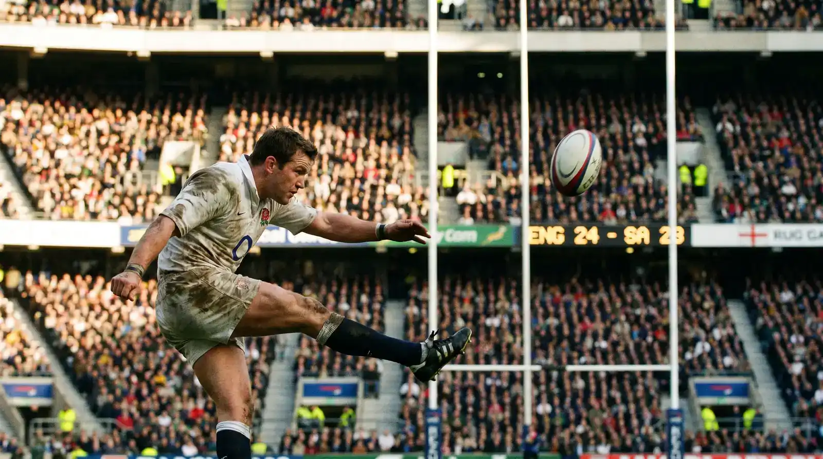 Fly-half lining up a penalty kick at the posts during a Premiership rugby match